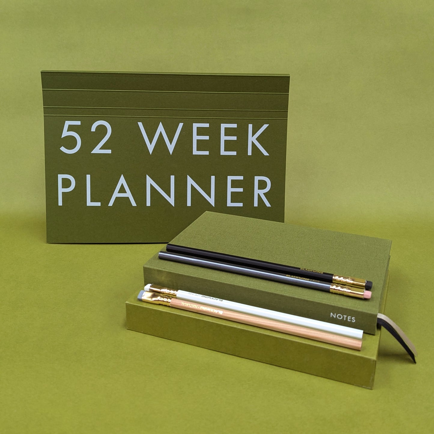 Collection shot of Rebel Stationery's Planning bundle on green background - Moss version
