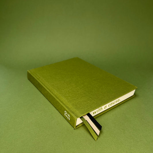 Rebel Stationery's Signature Moss 2025 diary, on a green background