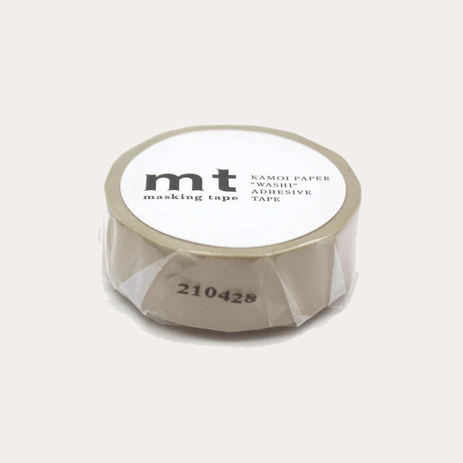 Roll of beige mt masking tape on a white background