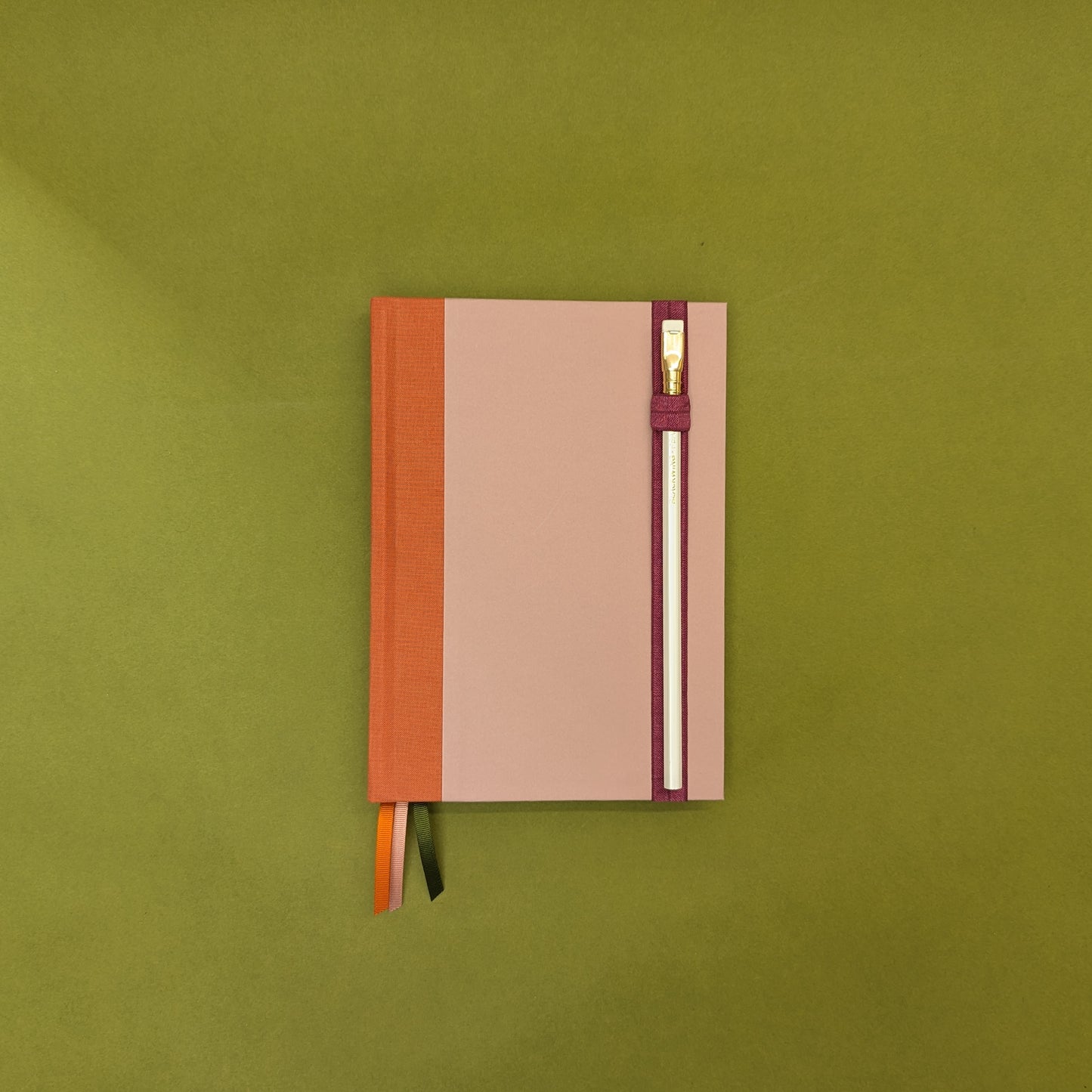 Rebel Stationery's Burgundy Elastic Pen Loop with white Blackwing Pencil