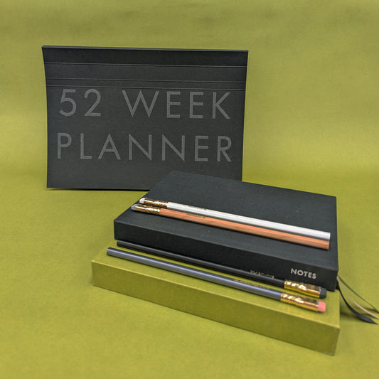 Collection shot of Rebel Stationery's Planning bundle on green background - Ink version